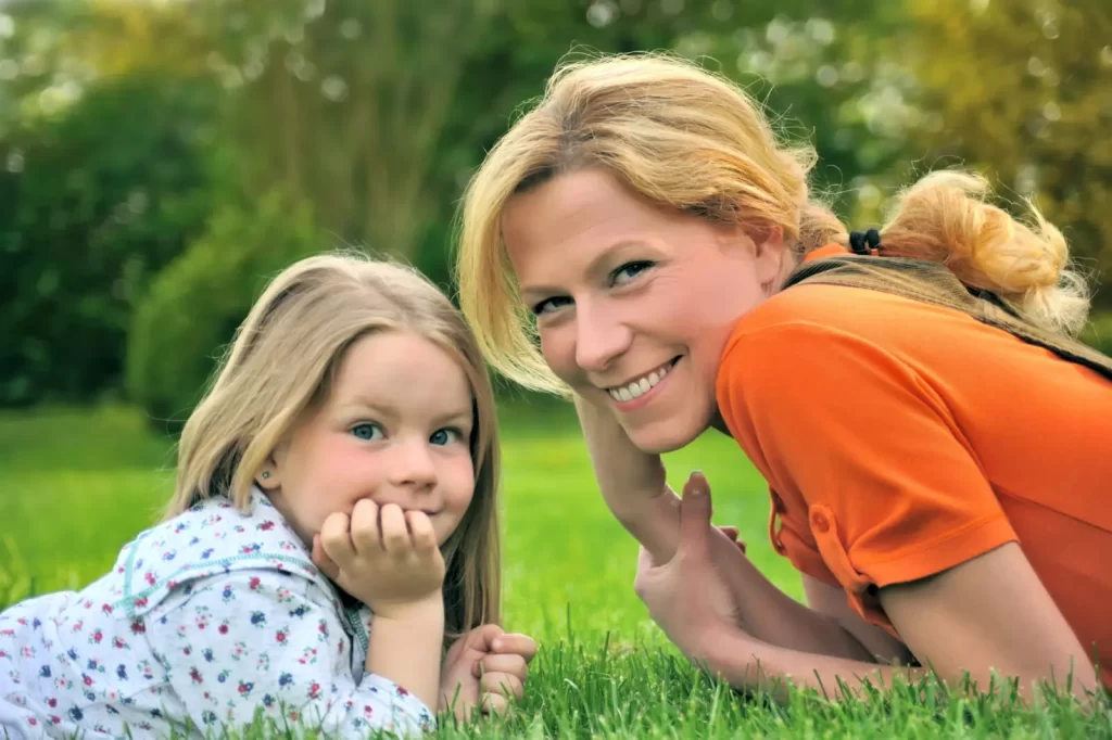A picture of a mother and daughter on a beautiful lawn, Lawnscience Otley Lawn Care
